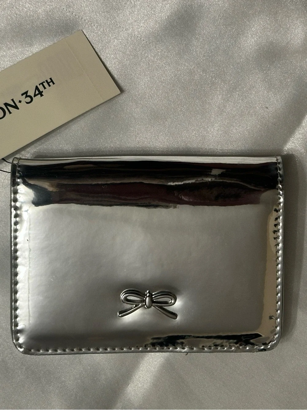 On 34th NWT Joesil Metallic Bi-fold Wallet-Mirror Silver
